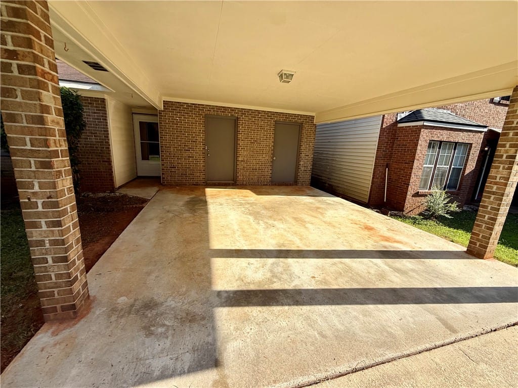 806 Choctaw Ave, Auburn, AL 36830, A spacious carport offers convenient, covered park