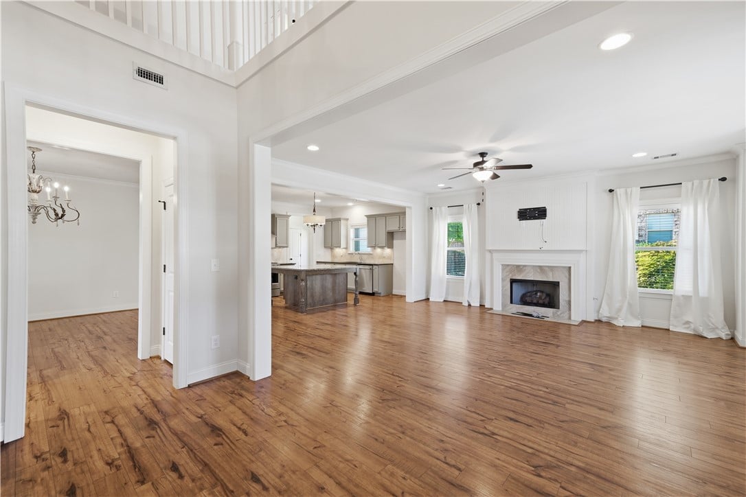 1135 Southridge Ct, Auburn, AL 36832, Rich wood floors flow seamlessly from the entry th
