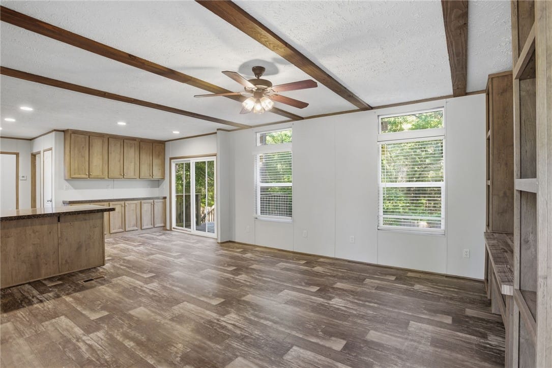 37 Pioneer Dr, Seale, AL 36875, A spacious room features exposed wooden beams, dur