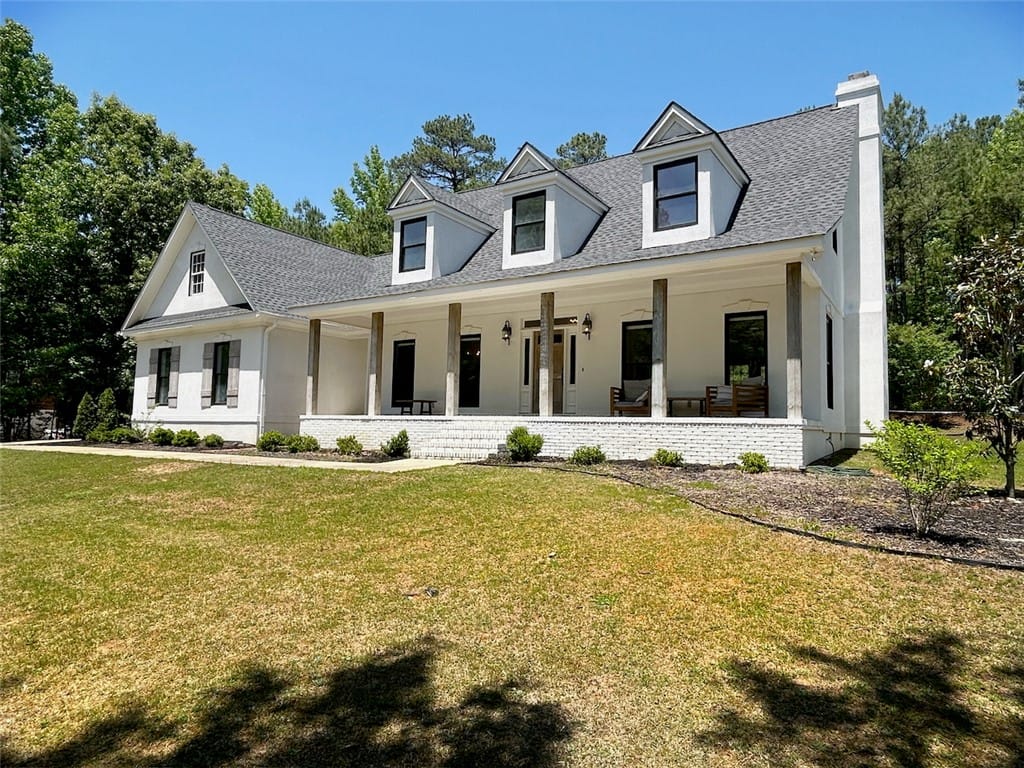 2004 Moores Mill Rd, Lanett, AL 36863, This classic white residence offers a welcoming fa