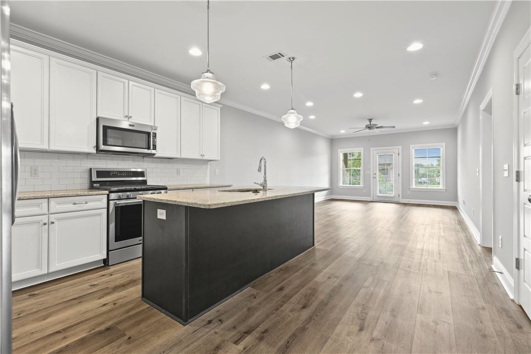 1413 NEW ARBOR, Auburn, AL, 36830, A streamlined open-concept kitchen and living area