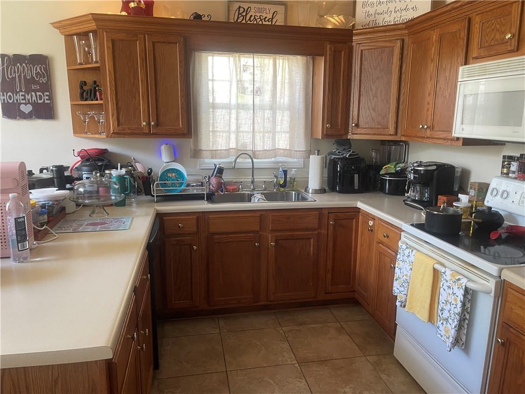 4251 CHESTNUT, Auburn, AL, 36801, A warm and inviting kitchen featuring honey-toned