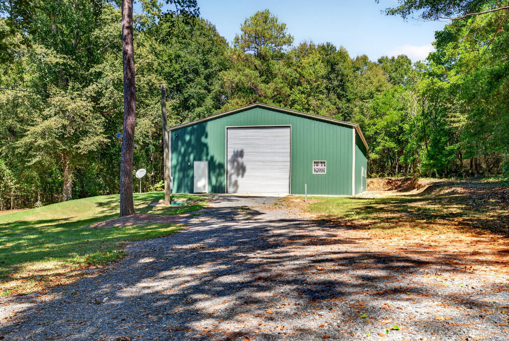1337 Johnny Miller Rd, Buena Vista, GA 31803, 12 ft high garage door for great access
