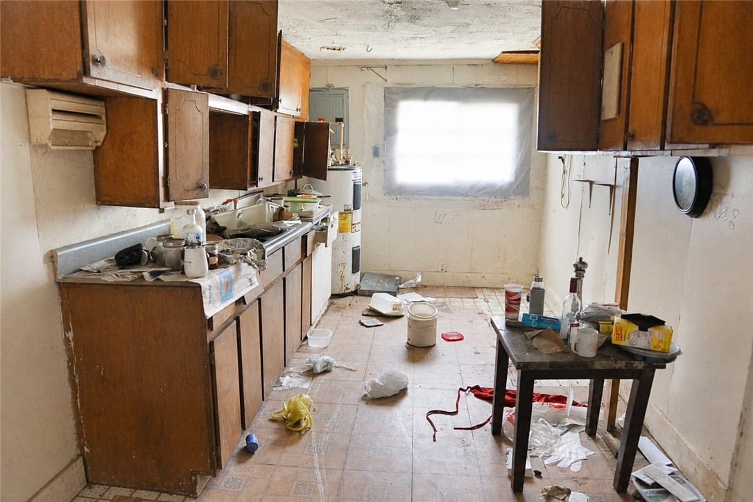 621 1st St SE, La Fayette, AL 36862, A utilitarian kitchen awaiting transformation, fea