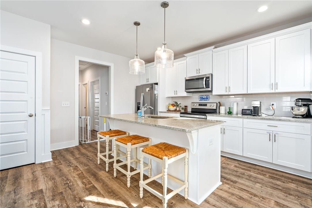 Opelika, AL 36801, Kitchen and dining areas connect naturally to the