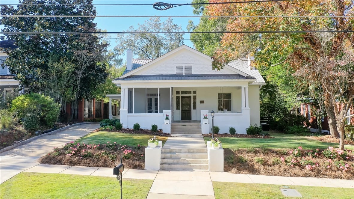 606 N 8th St, Opelika, AL 36801, A charming home welcomes with a screened porch and