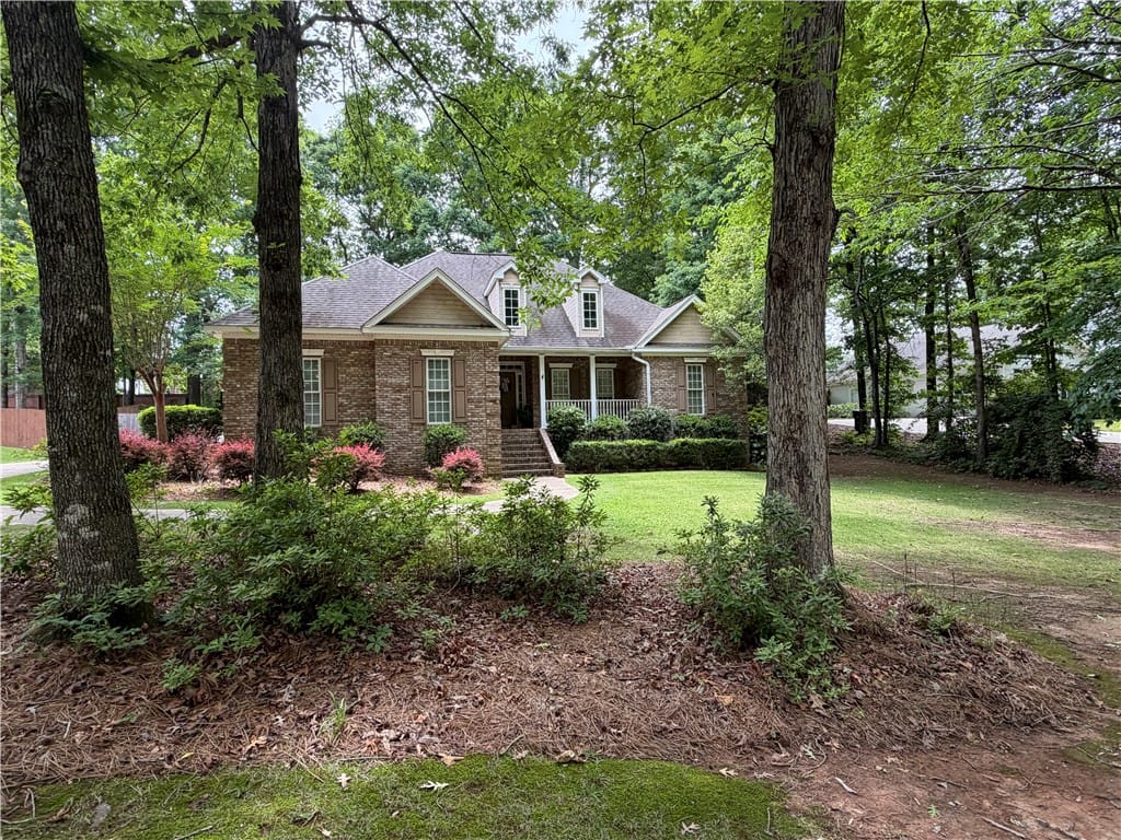 511 Winterburn Ave, Opelika, AL 36801, This charming home features a classic brick exteri