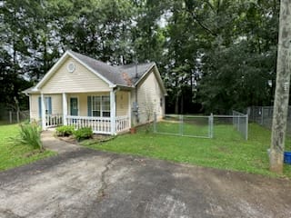 1909 26th St, Valley, AL 36854, USA, A charming cottage residence with a quaint front p