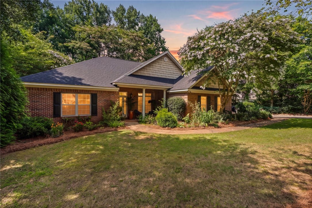 110 N Cedarbrook Dr, Auburn, AL 36830, A classic brick exterior with a welcoming front en