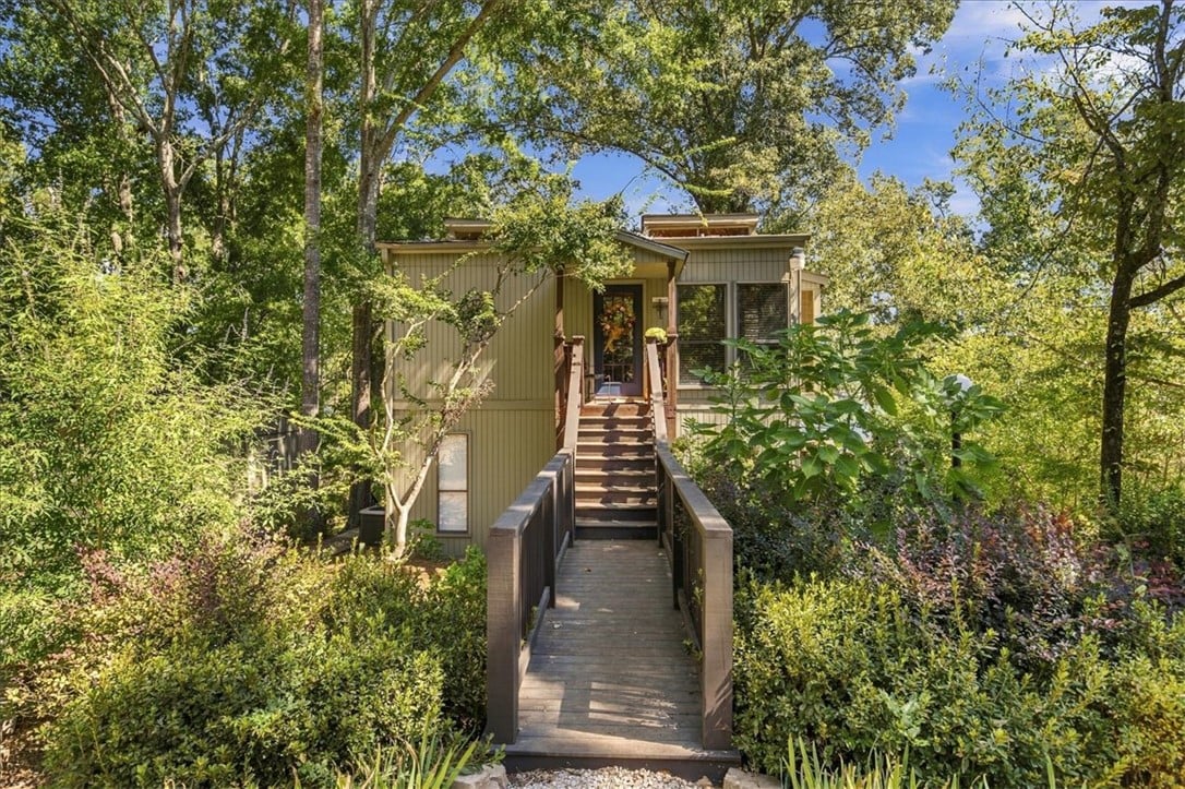 140 Natchez Rd, Dadeville, AL 36853, An inviting wooden footbridge leads directly to th