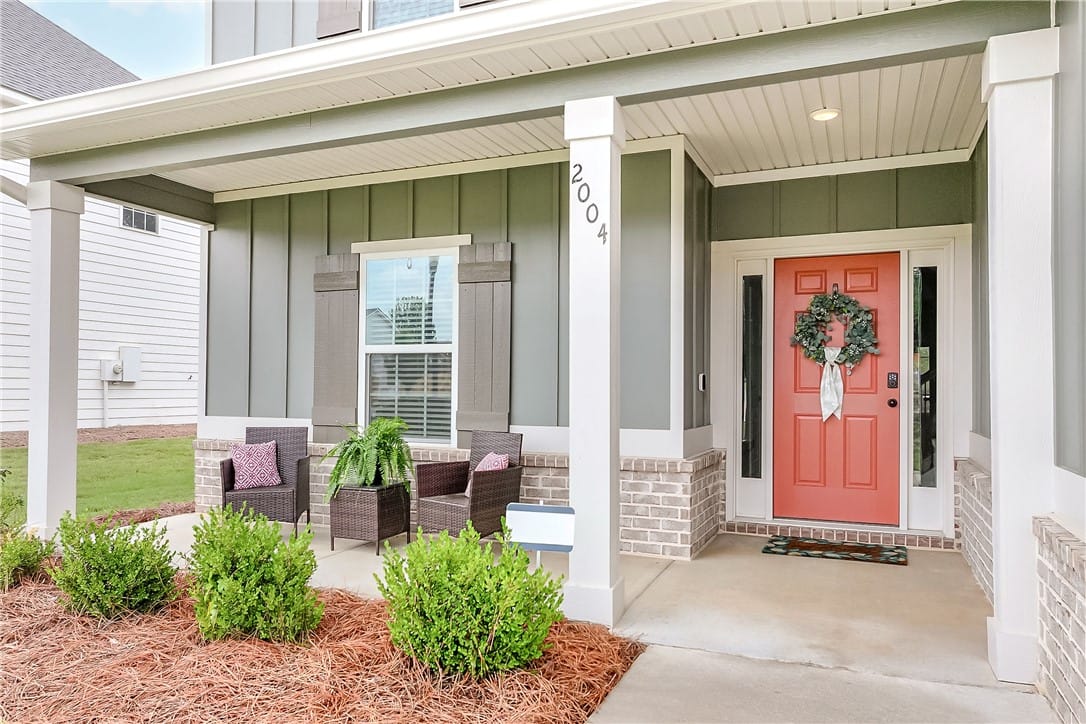 2004 Mallory Ln, Opelika, AL 36804, A welcoming covered porch with ample space for out