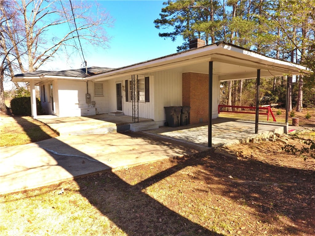 721 Woodland Rd, Alexander City, AL 35010, Upper Carport. There are two.