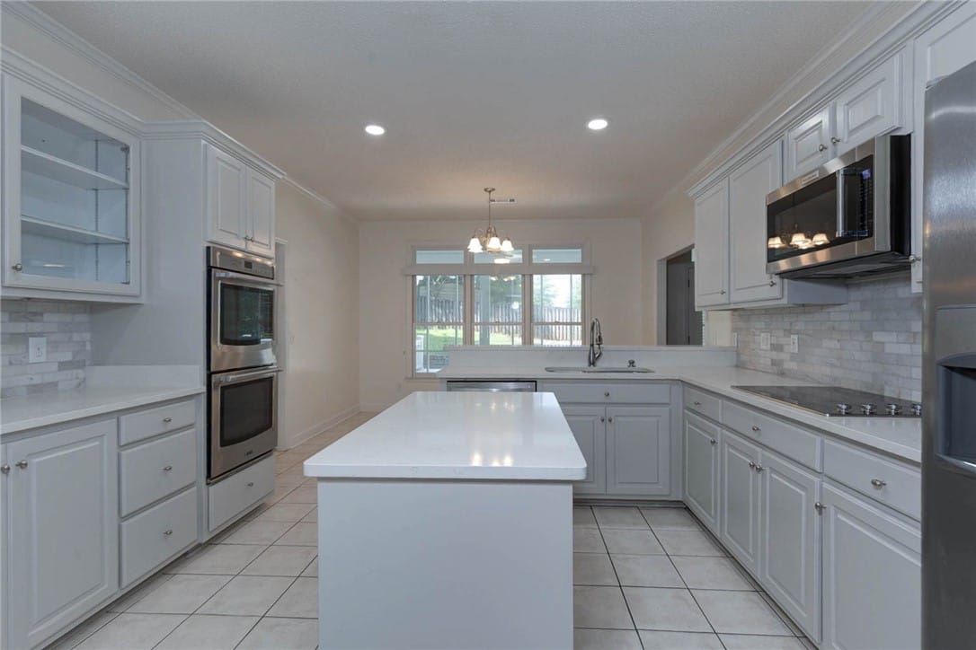 513 Winterburn Ave, Opelika, AL 36801, Gleaming white countertops and light cabinetry def