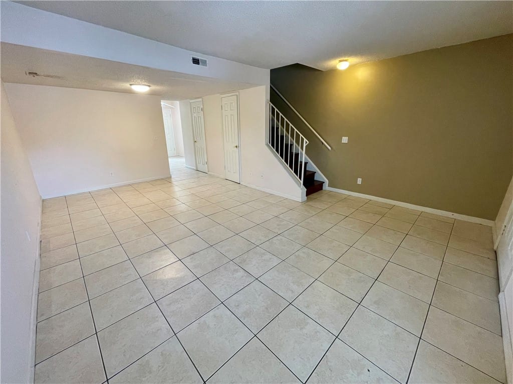 1761 WIRE #213, Auburn, AL 36832, A spacious common area with durable tile flooring