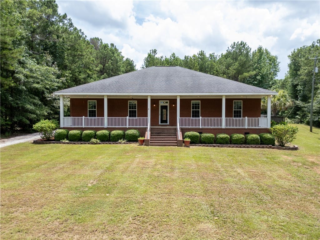 10405 US-29, Valley, AL 36854, A classic brick facade welcomes you, framed by a f