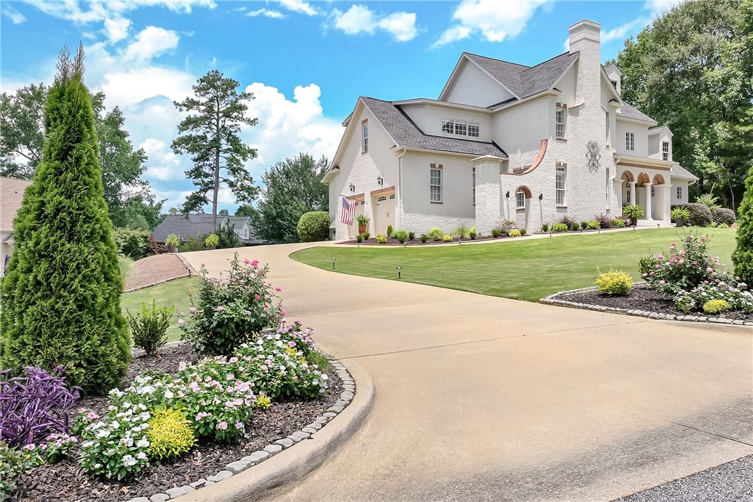 3308 Stonybrook Pl, Opelika, AL 36804, A graceful circular drive leads to a striking, met