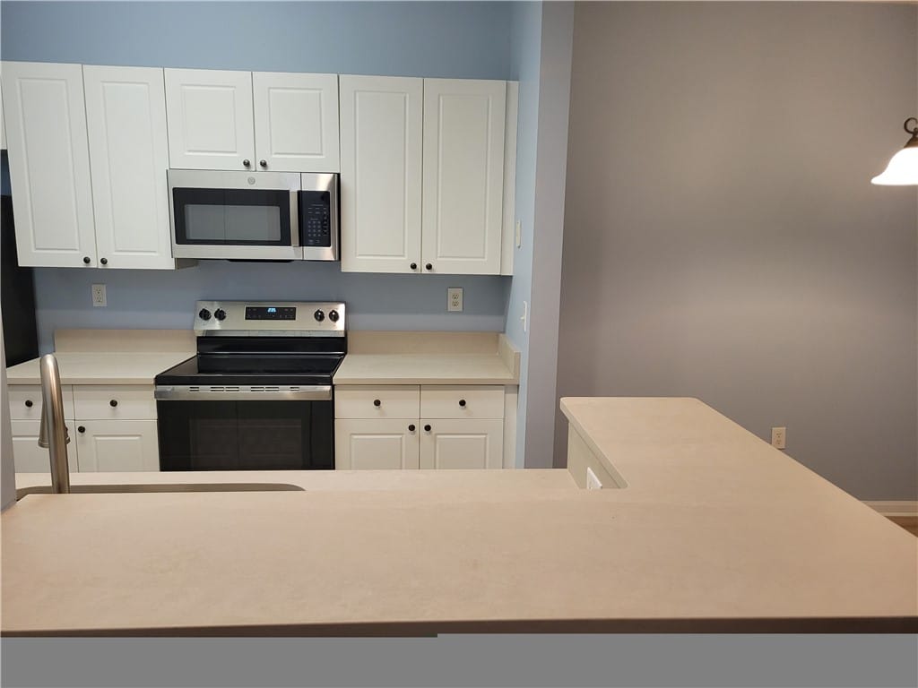 Auburn, AL 36830, White cabinetry with sleek hardware and modern app