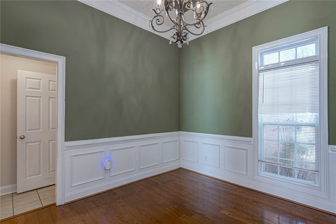 2278 Core Dr, Auburn, AL 36830, Elegant wainscoting and polished hardwood flooring