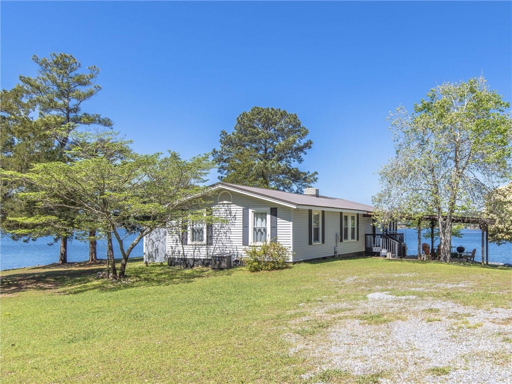 1710 Point Windy Dr, Jackson's Gap, AL 36861, Lakeside home featuring a charming covered patio a