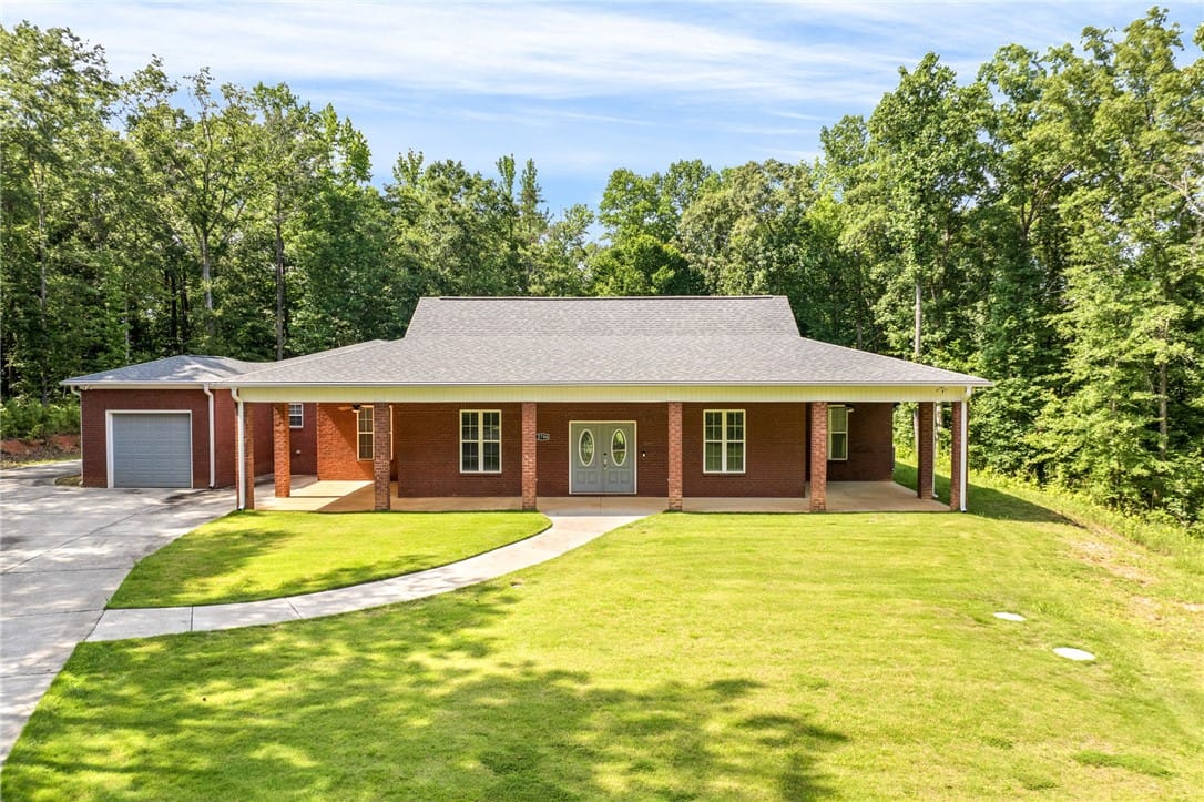 2706 Ridge Rd, Opelika, AL 36804, A spacious brick residence nestled among lush tree