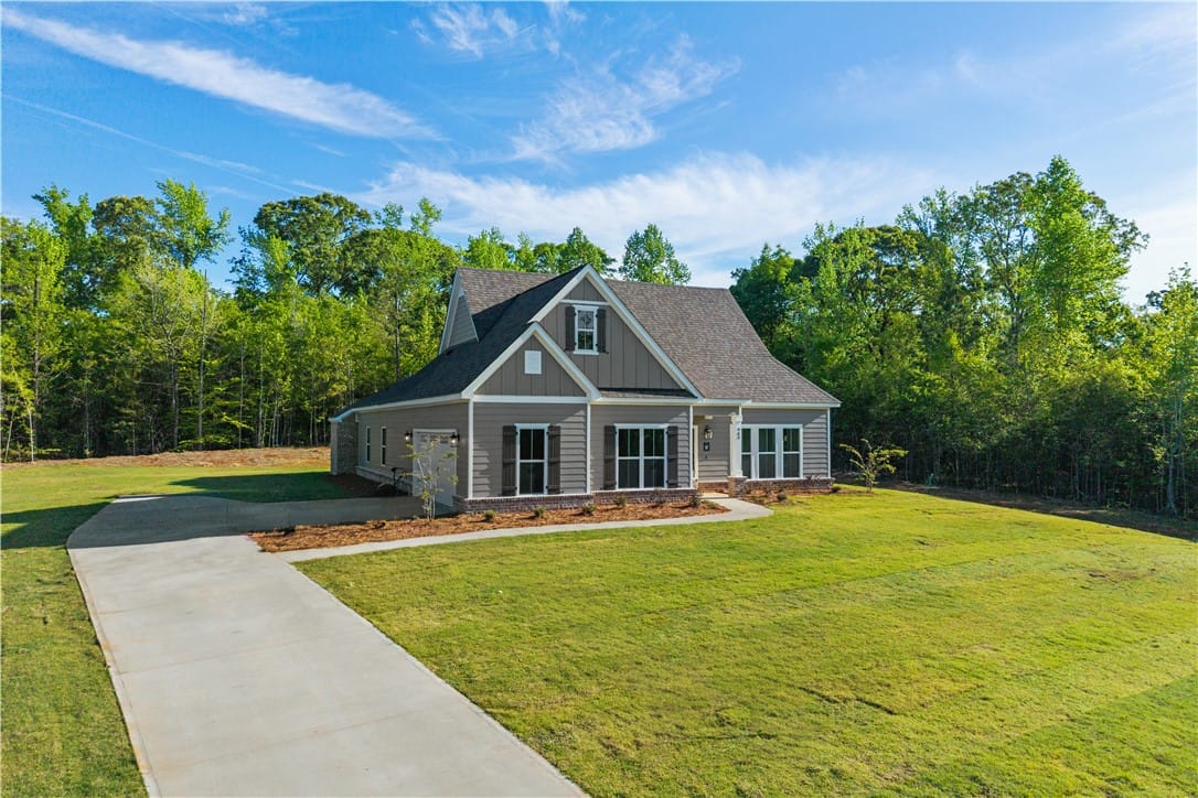 2 Lee Rd 344, Salem, AL 36874, A well-maintained lawn and extended driveway enhan