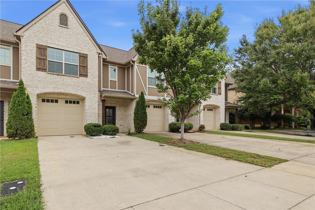 2024 Stephanie Ct, Auburn, AL 36830, Stately brick and stone masonry highlights the ext