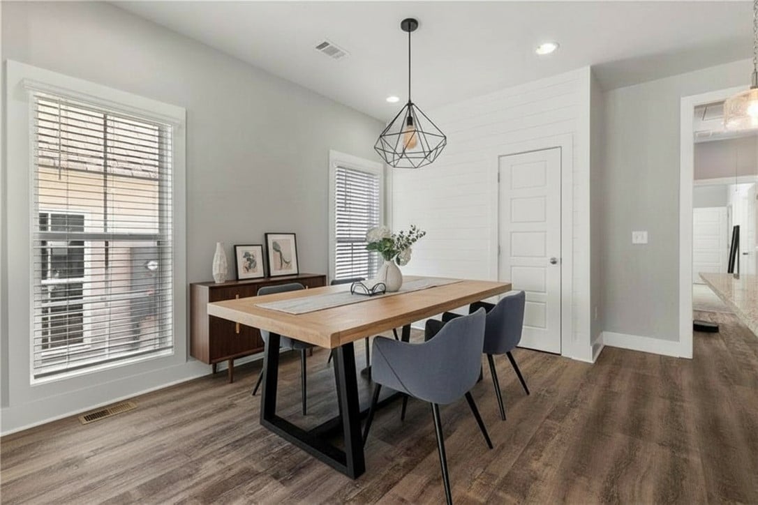 1286 Burrow Cir, Opelika, AL 36801, A spacious dining area features tall windows, clea