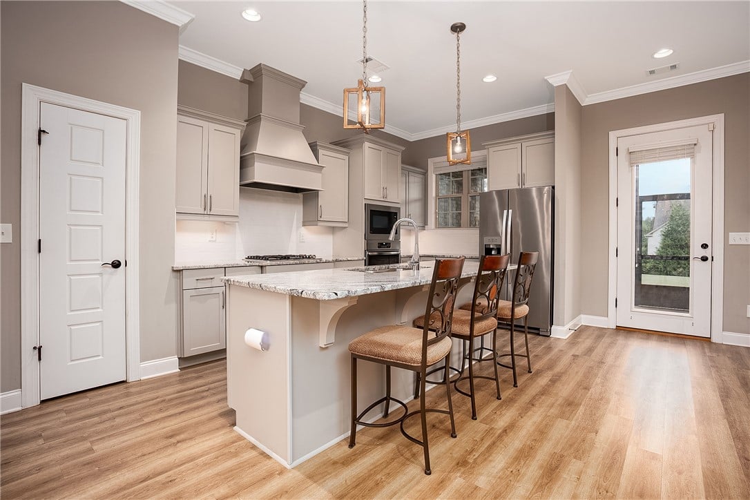 2913 Spring Lakes Crossing, Opelika, AL 36801, Polished stone counters, custom cabinetry, and war