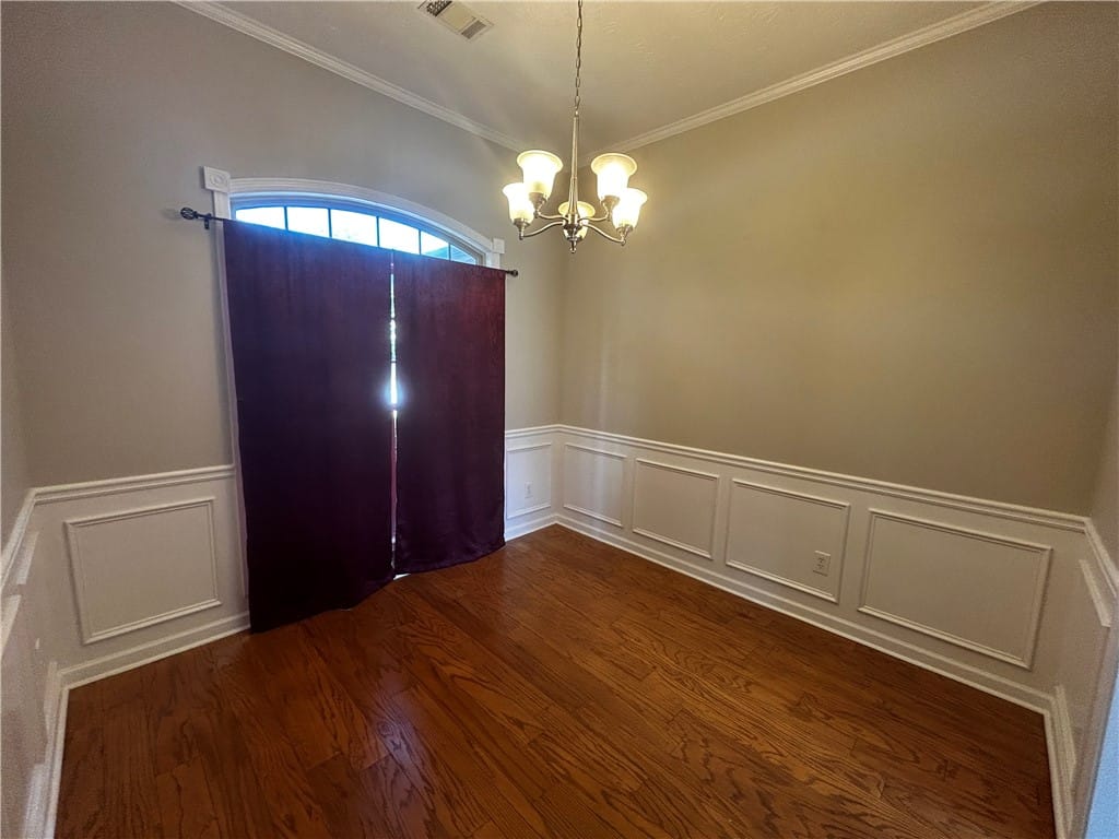 249 Deerfield Ct, Auburn, AL 36832, Elegant hardwood flooring grounds a refined dining