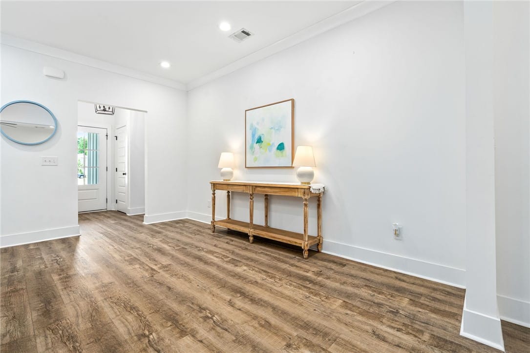 569 N Cedarbrook Dr, Auburn, AL 36830, A welcoming entry space with wide plank flooring e