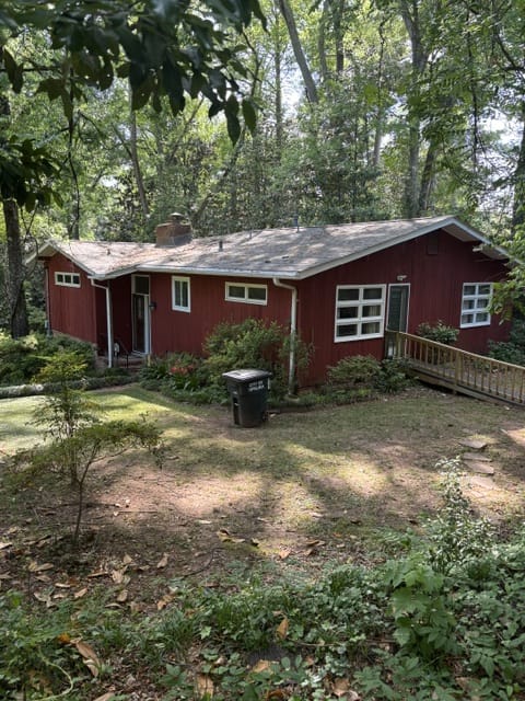 611 N 9th St, Opelika, AL 36801, A private, verdant setting surrounds this charming
