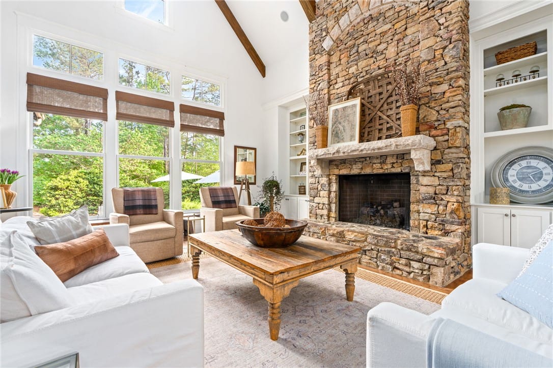 3207 Turkey Spur Ln, Opelika, AL 36801, A vaulted ceiling with wood beams and stone firepl