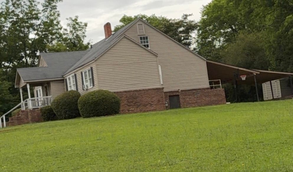 6504 24th Ave, Valley, AL 36854, A classic facade featuring brick and siding, compl