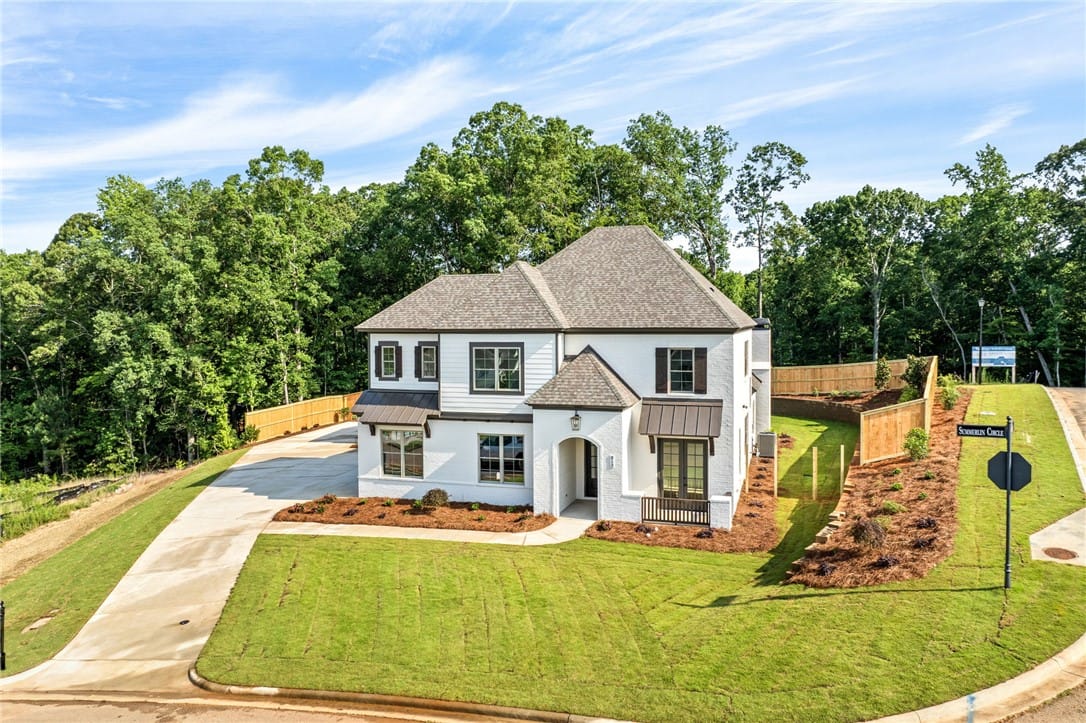 813 Summerlin Dr, Auburn, AL 36830, USA, A striking white home with dark accents and a well