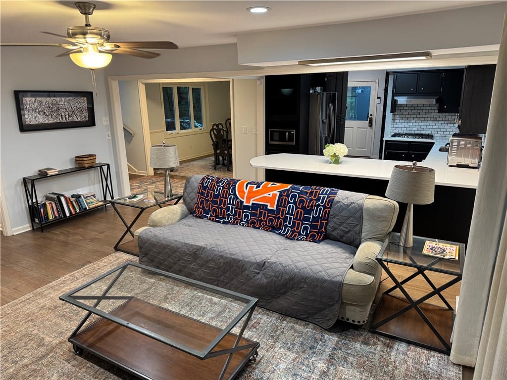 1327 Owens Rd, Auburn, AL 36830, An inviting open-concept living area flows seamles