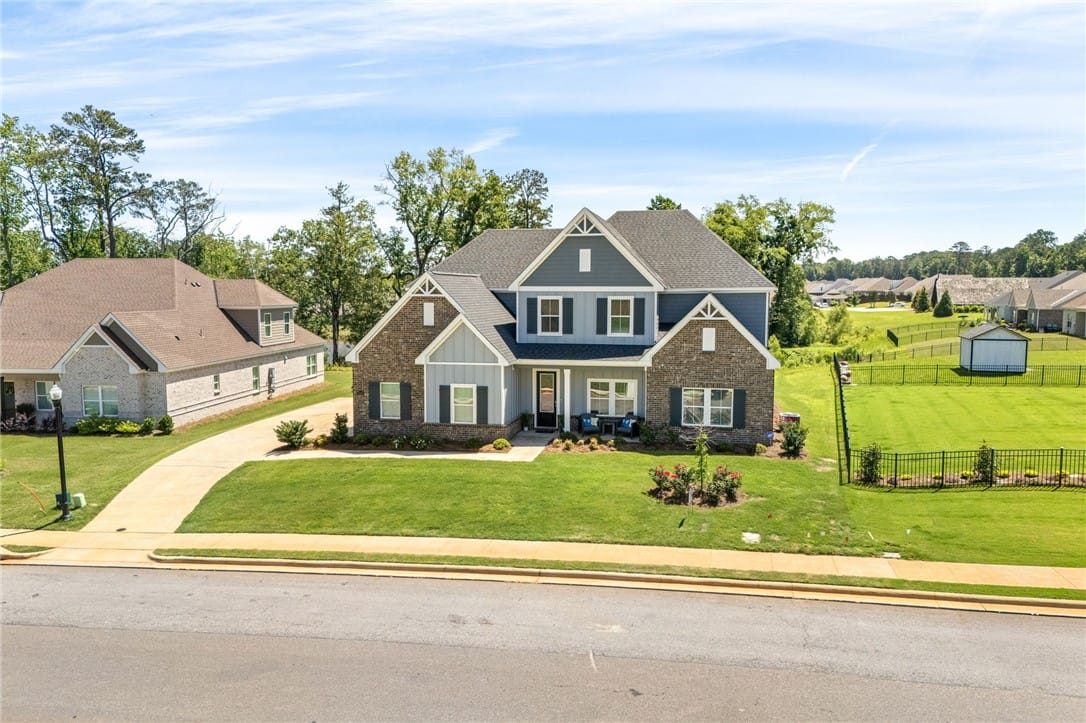2046 Brock Dr, Opelika, AL 36801, A classic two-story residence presents a meticulou
