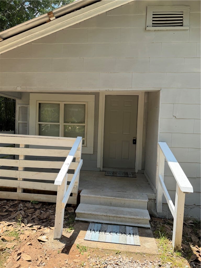517 Vickerstaff St, Auburn, AL 36832, Concrete steps lead to a welcoming entry on this f