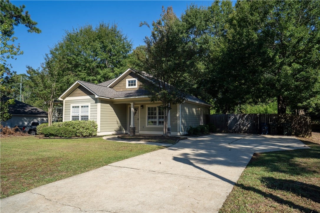 365 Embry Ln, Auburn, AL 36830, Mature trees frame a charming siding home featurin