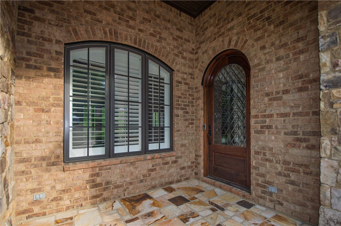 1646 Heron Pointe, Auburn, AL 36830, Arched windows and a stately front door enhance th