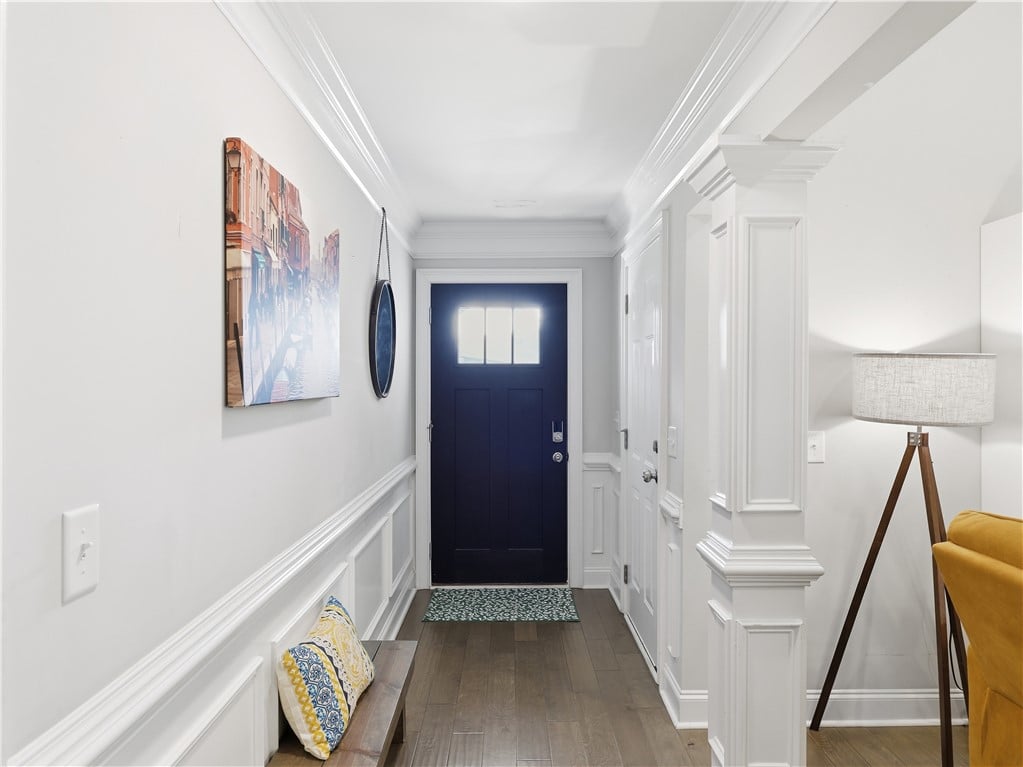 2529 Sophia Ct, Auburn, AL 36830, Elegant crown molding and wainscoting line a welco