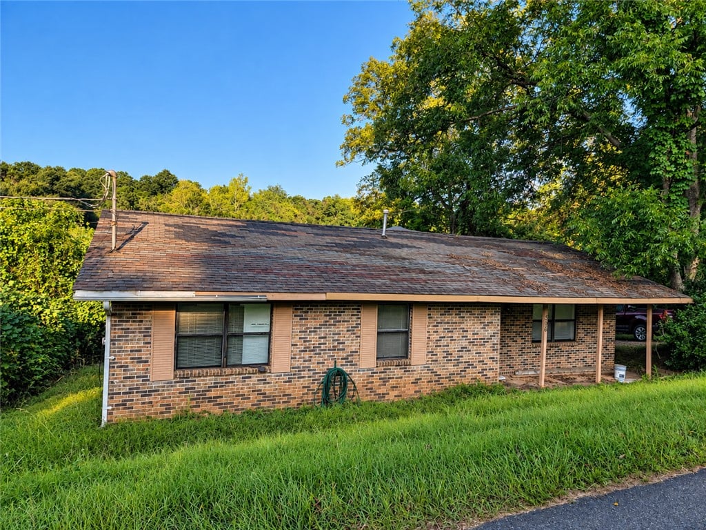 396 Herren St, Dadeville, AL 36853, USA, Classic brick siding and a covered front porch def