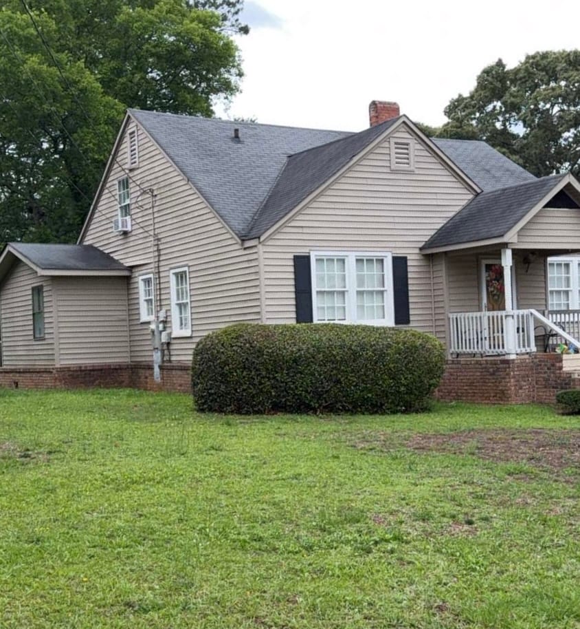 6504 24th Ave, Valley, AL 36854, A classic exterior with wood siding, a welcoming p
