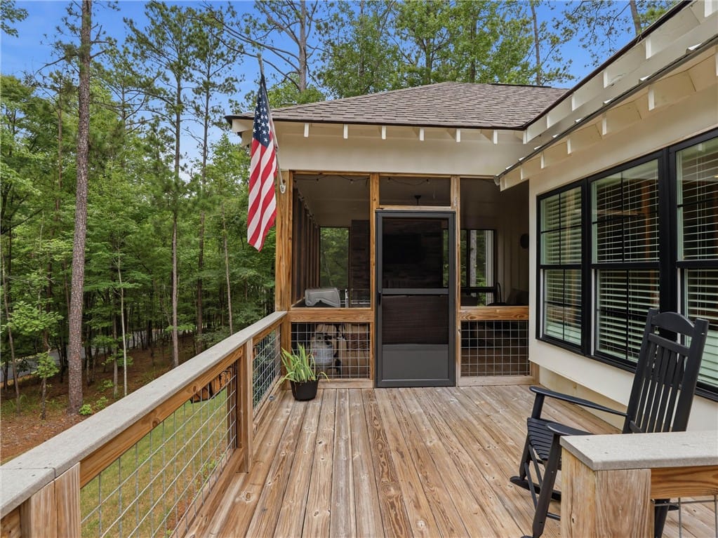 18 Hart Ln, Dadeville, AL 36853, A spacious wooden deck provides ample outdoor livi
