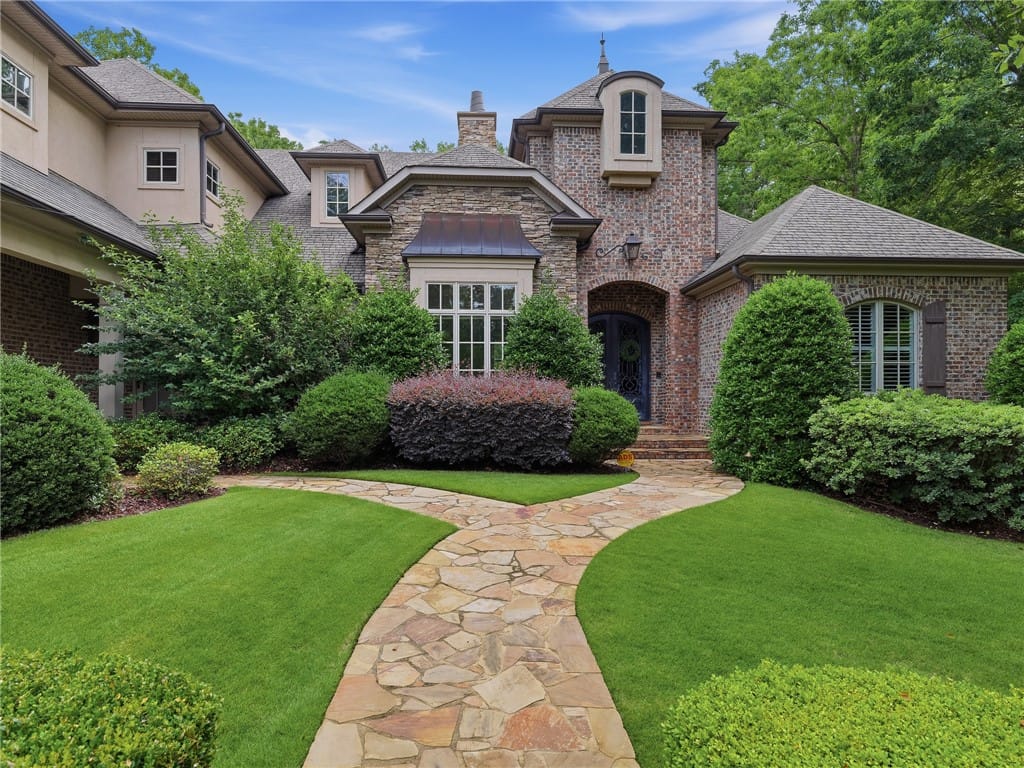1725 Altamont Ct, Auburn, AL 36830, A graceful stone pathway guides you through meticu