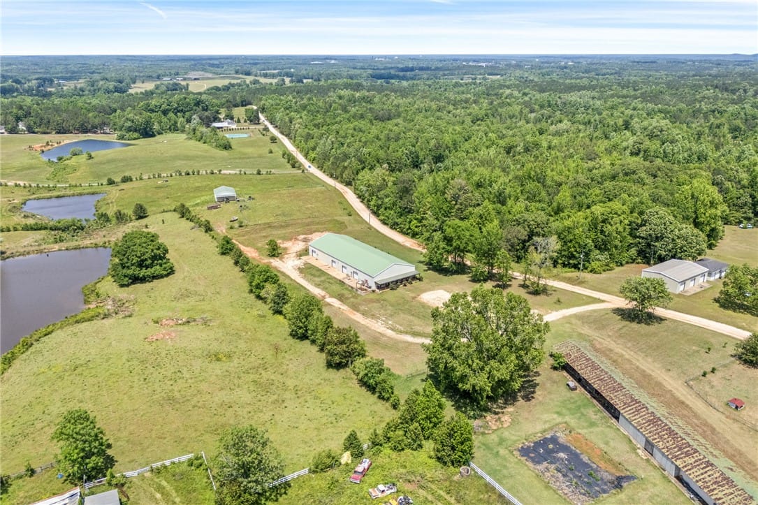 1049 County Rd 539, Valley, AL 36854, Expansive rural property with multiple outbuilding
