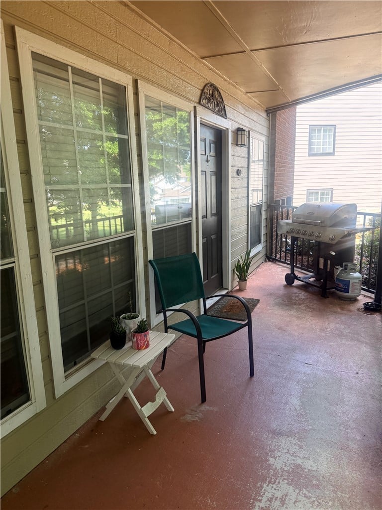 124 Shug Jordan Pkwy #124, Auburn, AL 36832, A covered concrete patio offers an inviting outdoo