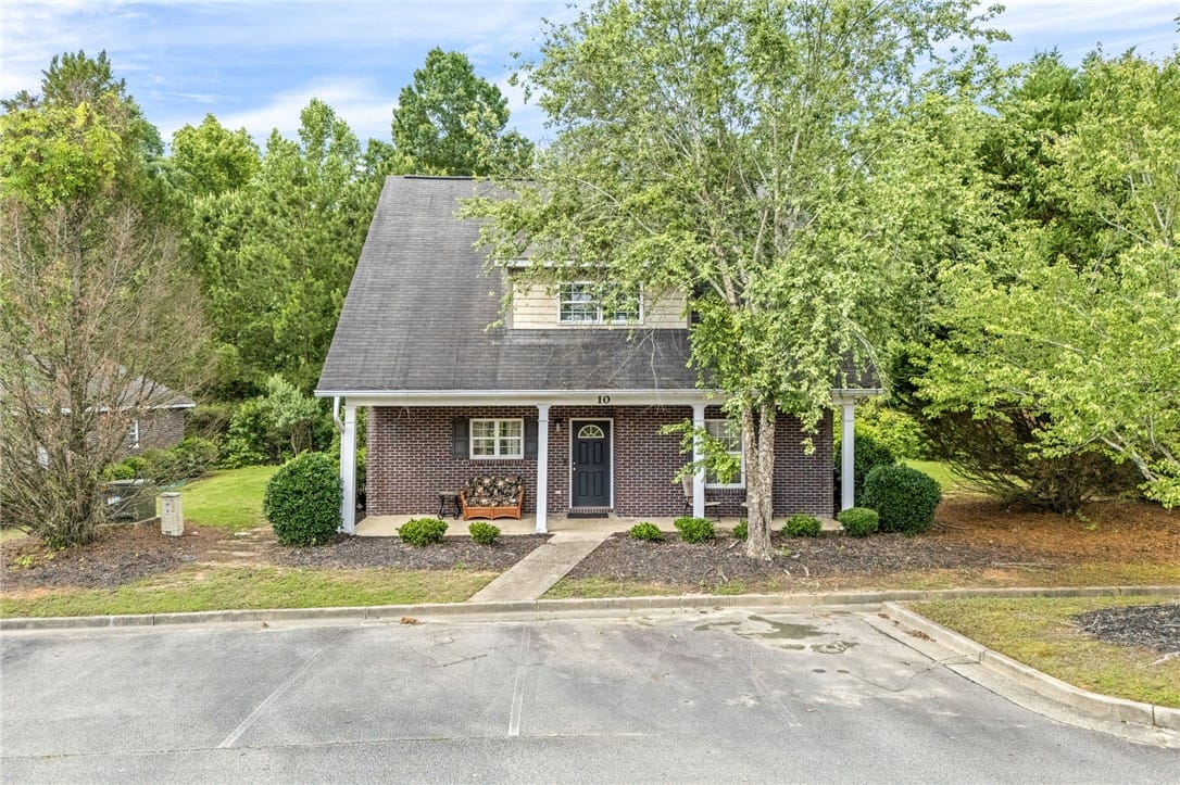 807 W Longleaf Dr Unit 10, Auburn, AL 36832, Brick facade with inviting porch and established l