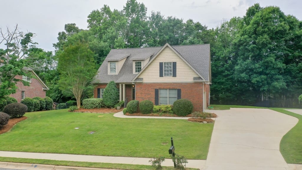 809 Madeline Ln, Auburn, AL 36832, A classic brick-front home features dormer windows