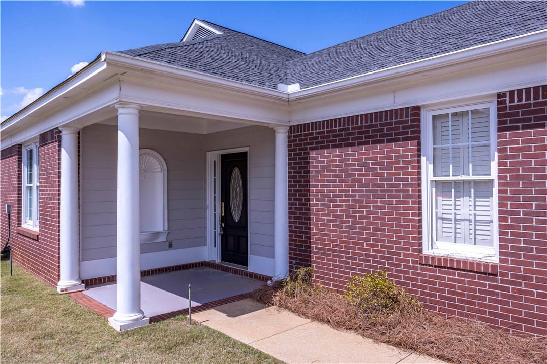 5011 Fall Branch Ct A, Phenix City, AL 36867, A welcoming brick and siding exterior with a cover