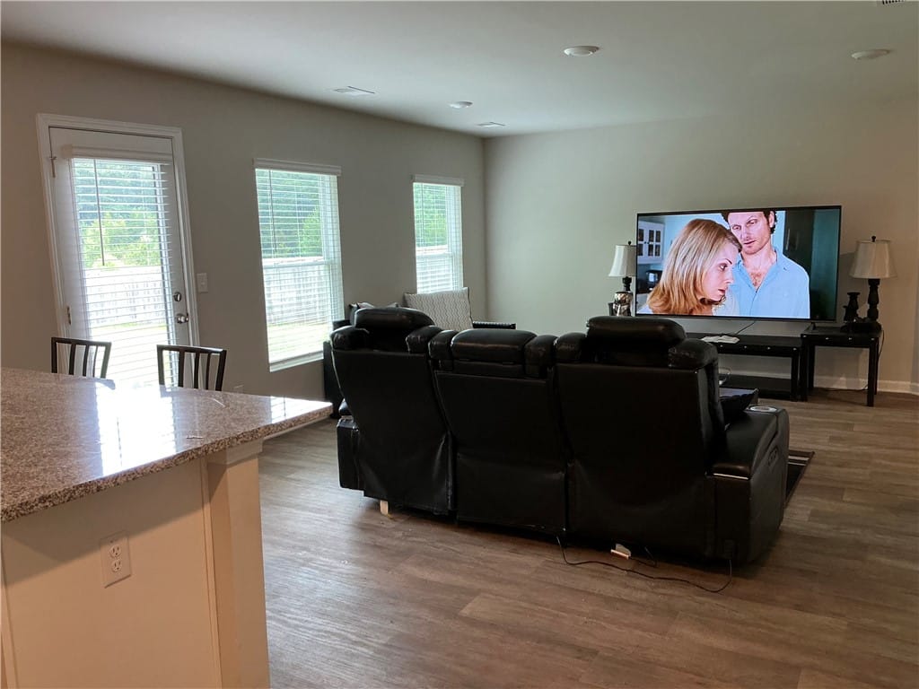 1081 Lizlin Dr, Opelika, AL 36801, Laminate flooring graces this open-concept living